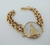 Pulseira Nossa Senhora Aparecida Resina Pérola - Banhada a Ouro 18k - comprar online