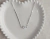 CHOCKER BOLINHAS COM CORAÇÃO EM ZIRCÔNIA CRISTAL, BANHADO A PRATA