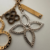 Imagem do Chaveiro Louis Vuitton Tapage Monograma