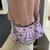 Bolsa Balenciaga Le Cagole Lilás na internet