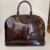 Bolsa Louis Vuitton Alma GM em Verniz Amarante na internet