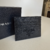 Porta-cartões Prada em couro Saffiano All Black - loja online