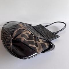 Fendi To You Zucca Maxi Clutch na internet
