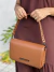 BOLSA PEQUENA MARROM DE TACHAS SL - MG CONCEPT