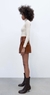 Short simil cuero Zara - The Bling