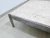 Mesa de centro com tampo de mármore e estrutura em metal. - comprar online