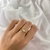 Anillo barbado con ovalo cristal en internet
