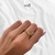 Anillo en X dorado