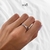 Anillo en lazo X plateado