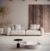 Sofá Cachos em ambiente moderno, com almofadas e mesa de centro elegante.