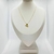 Conjunto coração esticadinho banhado a ouro 18k, dourado e elegante.