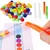 Jogo de Classificação e Coordenação Motora Fina com Pinça, Card, Pompons Coliridos e Tubo de Ensaio - comprar online