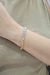 Pulseira Triângulos Dois Banhos - comprar online