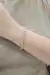 Pulseira Triângulos Dois Banhos - comprar online