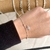 Pulsera de acero blanco con dijes de planetas