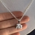 Conjunto con dije de elefante de acero blanco