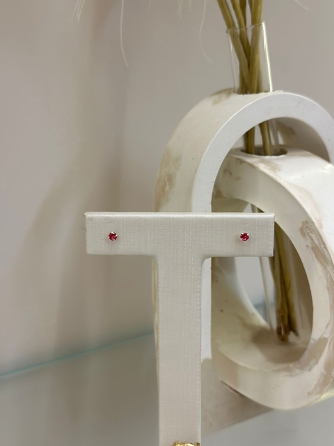 Brinco ponto de luz pink