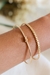 Pulseira Bracelete Trançado Camila Banhado a ouro 18k na internet
