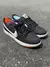 NIKE DUNK PRETO SIMBOLO BRANCO