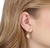Brinco trevo banhado a ouro 18k