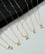 Colar Letra Cravejado Dourado - comprar online