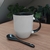 Caneca com colher preta Enfermagem na internet