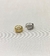 Piercing fake duplo cravejado