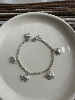 Pulsera de plata mini rolo y elefantes en internet
