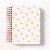 Agenda Entre Pétalas com capa decorada por flores coloridas e data 2026 na parte frontal.