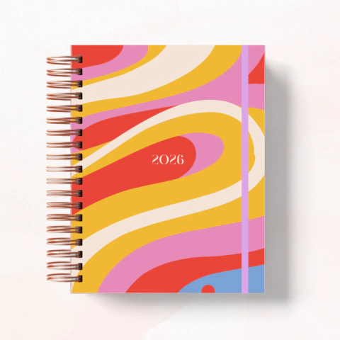 Planner Energia Colorida 2026 com capa espiralada e design abstrato em cores vibrantes