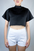 Cropped Kalifa com detalhe de trançado nas costas e gola inspirada na cultura africana, uma opção elegante e diferenciada para o seu guarda-roupa.