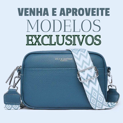 Bolsas de ombro crossbody de couro na cor azul com alça decorativa.