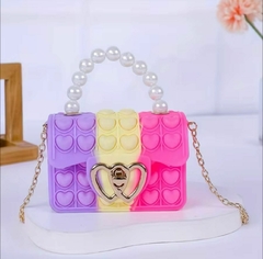 Bolsa pop it con perlas en internet