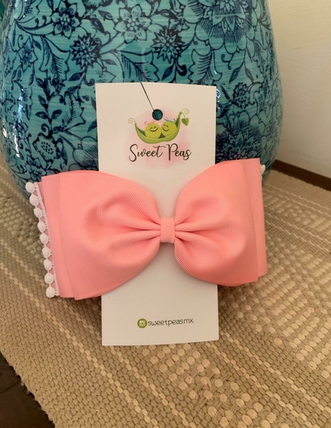 Moño rosa claro con orillas