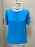 Blusa botão metalizado na internet
