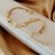 XB121255230 PULSERA PLANCHADA CON DIJES NUMEROS ROMANOS