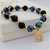 XB4156290 PULSERA CON DIJE OSO en internet