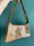 Bolsa baguete com zíper caramelo