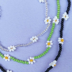 Choker margarida miçangas na internet