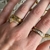 Anel liso com pedras de zirconias folheado a ouro - Lilia na internet