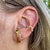 Piercing fake de pressão zigzag cravejado multicolor folheado a ouro - EDUARDA SCHMIDT ACESSÓRIOS