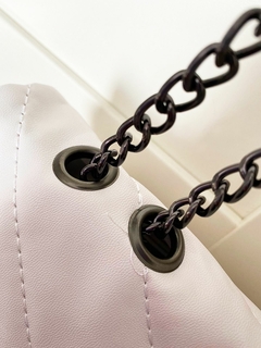 Bolsa metalassê Off White na internet