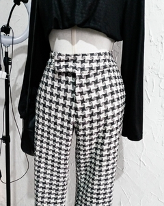 Calça flare em malha tweed
