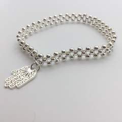 Pulsera tejida Mano de Fatima en internet