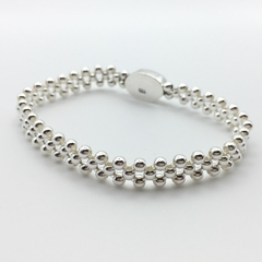 Pulsera tejida Oval Black Cross en internet
