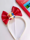 TIARA ESCOLAR VERMELHA COM APLIQUE DE LÁPIS 3D - comprar online