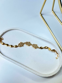 PULSEIRA MÃO FÁTIMA FOLHEADA A OURO na internet