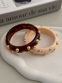Bracelete Resina detalhe dourado na internet