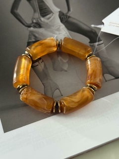 Pulseiras resina elástico na internet