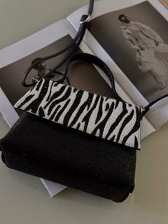 Bolsa brilho zebra na internet